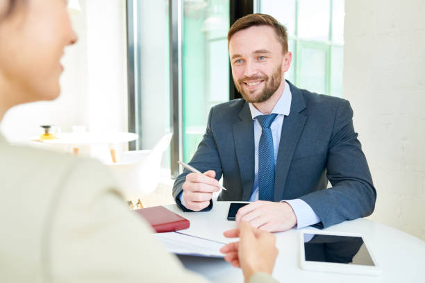 istock Handsome Businessman Discussing Partnership 961525906
