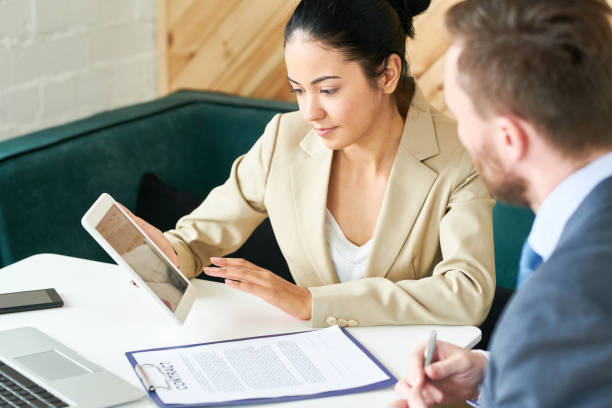 istock Young Businesswoman Working with Partner 961525940