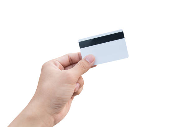 istock Man hand holding white credit card isolated on white background with clipping path 961529906