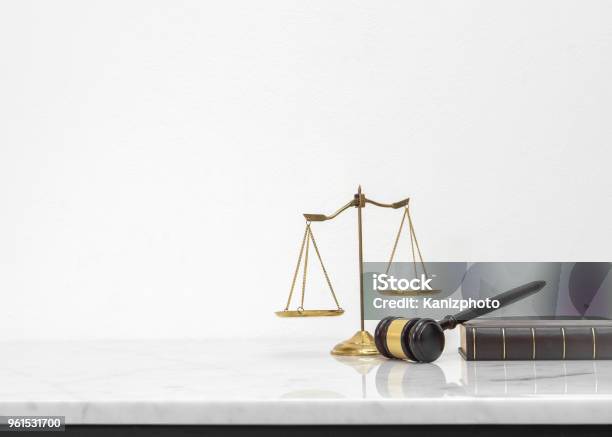 Wooden Gavel And Law Book Put On White Marble Table Top Counter With Copy Space Stock Photo - Download Image Now