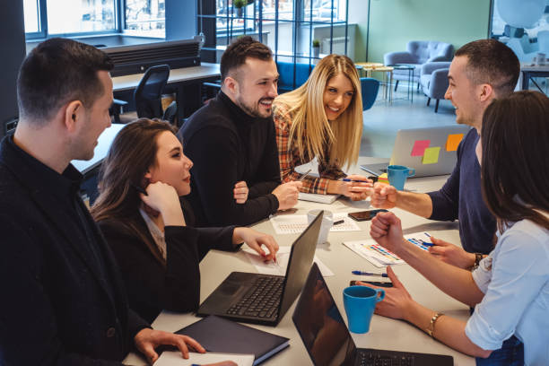 istock Colleagues celebrating success in a meeting 961540560