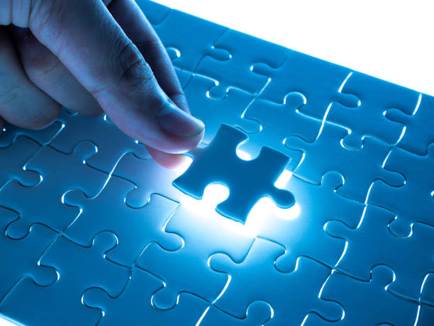 istock Missing Jigsaw puzzle piece with lighting, business concept for completing the finishing puzzle piece 961545942