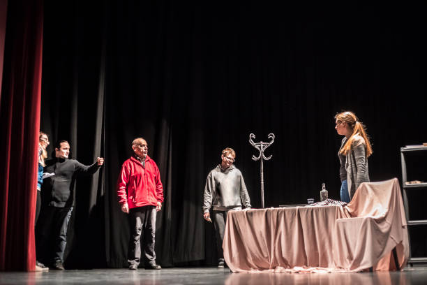 istock Group of Actors on Stage During Theatrical Performance 961551132