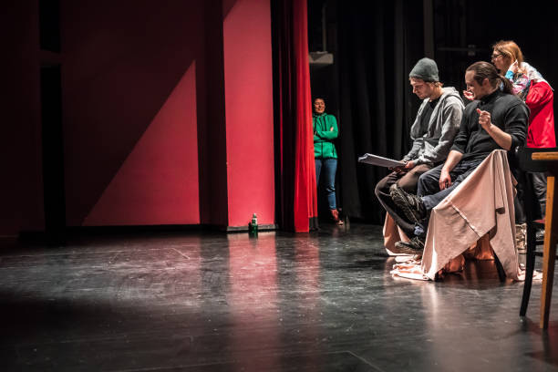istock Group of Actors on Stage During Theatrical Performance 961551142