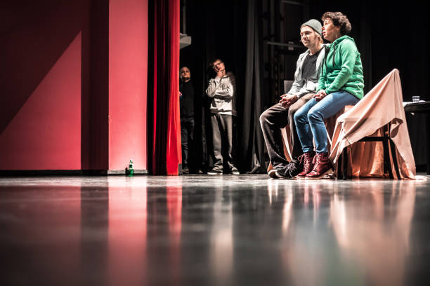 istock Group of Actors on Stage During Theatrical Performance 961551188