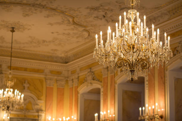 Chrystal chandelier in a splendid baroque room Chrystal chandelier in a splendid baroque room chandelier photos stock pictures, royalty-free photos & images
