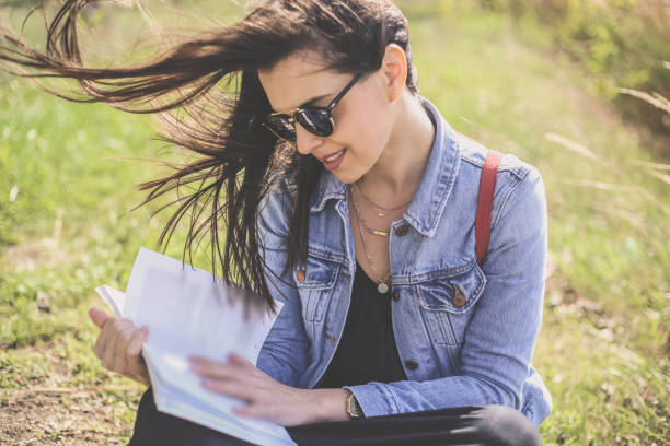 istock A women on the lake enjoys a book 961557616