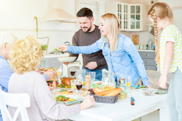 istock Festive Family Dinner in Modern Apartment 961560366