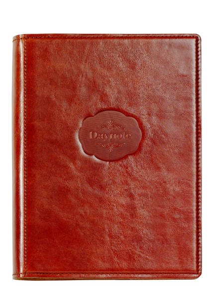 Diary in leather cover isolated on white. stock photo