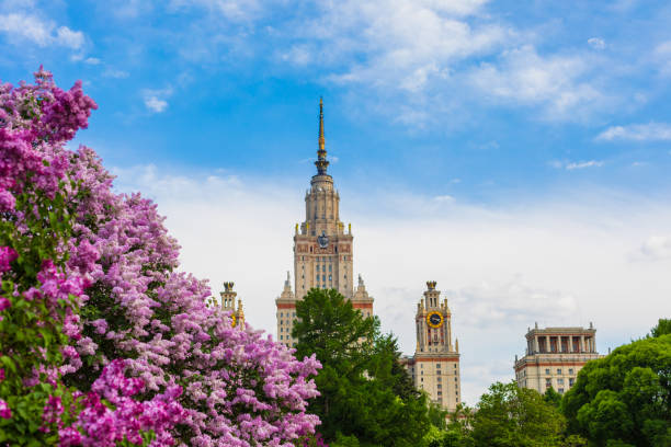 istock Moscow State University building with the blossoming lilac bushes 961561300