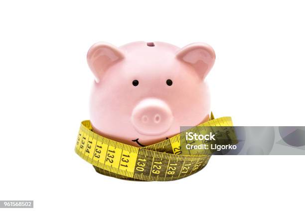 Piggy Bank With Measure Tape On White Background Stock Photo - Download Image Now - Tape Measure, Balance, Banking