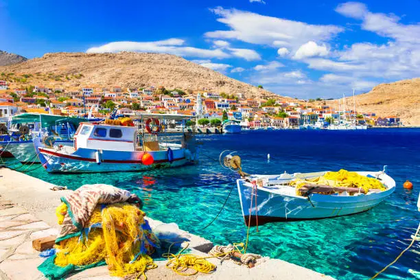 Photo of Colorful traditional Greece - beautiful island Chalki with fishing boats.Dodecanese