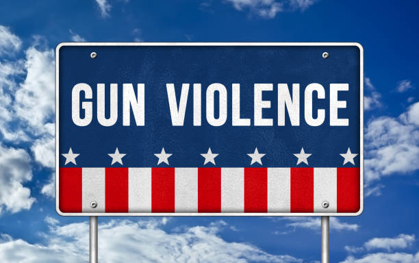 istock Gun Violence - road sign concept 961571256