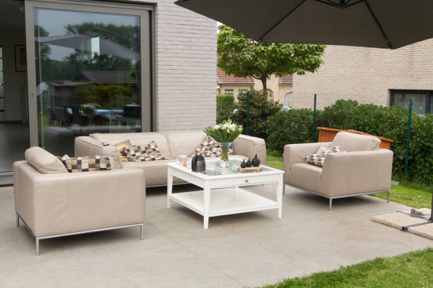 istock outdoor lounge leather sofa parasol sun umbrella shade luxury 961572214