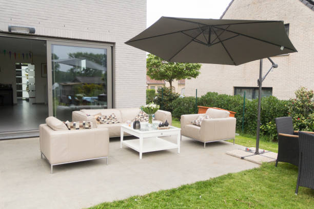 outdoor lounge leather sofa parasol sun umbrella shade luxury stock photo