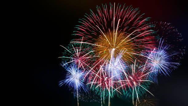 istock Abstract colored firework background with free copy space for text. Colorful celebration and anniversary concept for your design 961572354