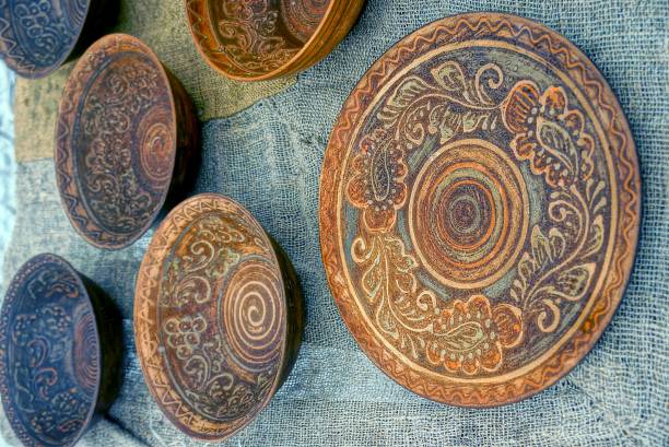 istock old wooden brown plates with a pattern on the table 961588488