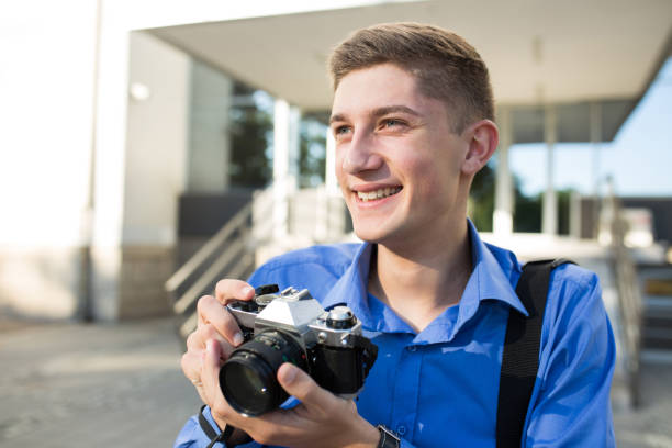 istock Happy photographer with vintage camera 961591446