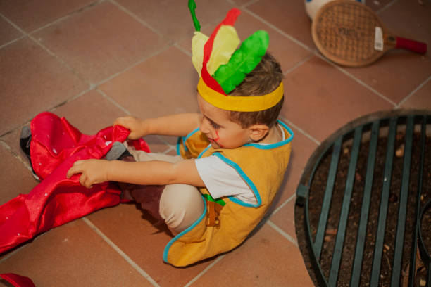 istock Portrait child dressing up as an american indian 961605728