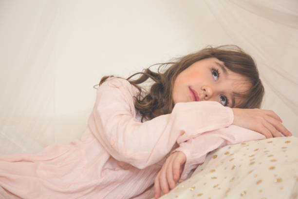 istock Little girl daydreaming 961615038