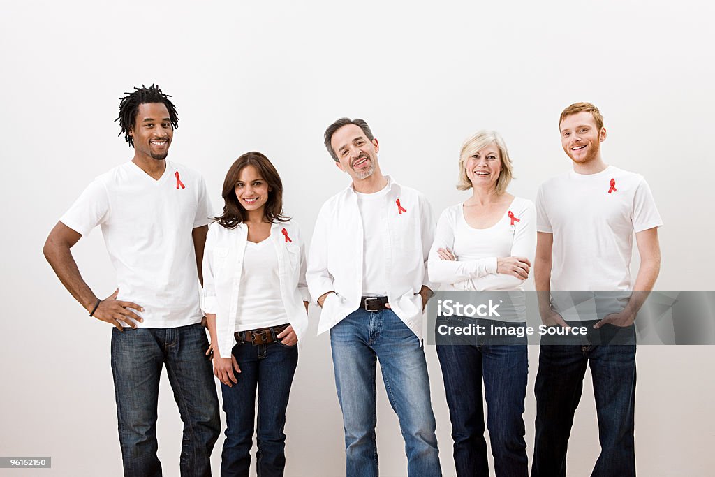 People wearing aids awareness ribbons  AIDS Stock Photo