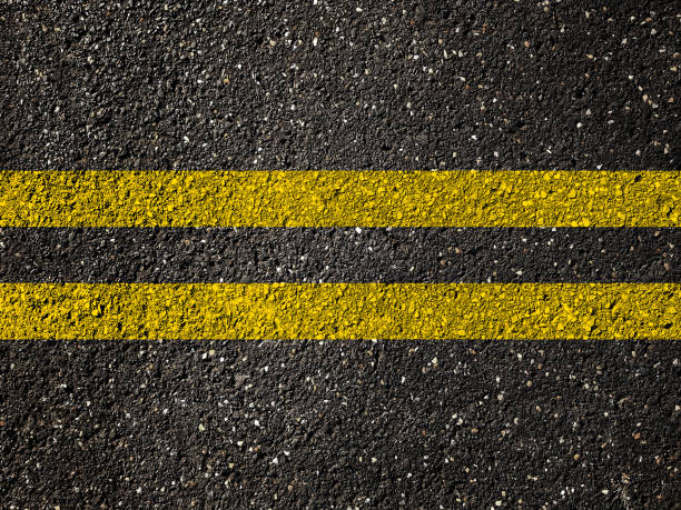 istock Asphalt road with double yellow lines 961628894