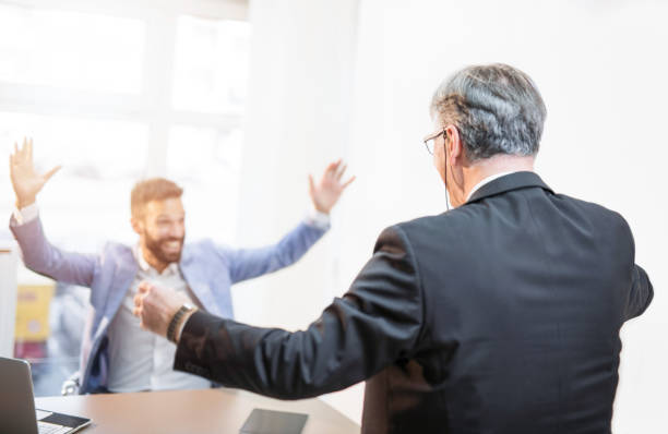istock Two happy businessmen celebrating life. 961629806
