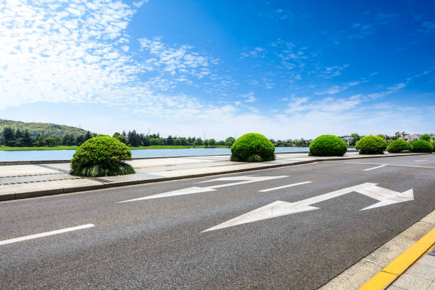 istock asphalt road and mountains with sky clouds landscape 961630052