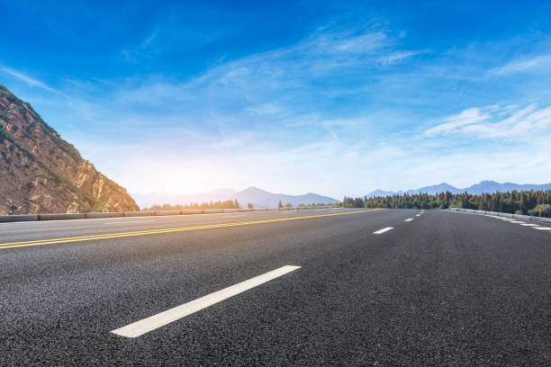 istock Empty asphalt road and hills with sky clouds landscape 961632926