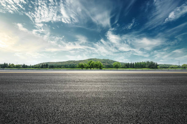 istock Asphalt road and mountain with clouds landscape at sunset 961633442