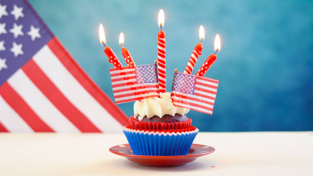 istock Red white and blue theme cupcakes with USA flags 961633562