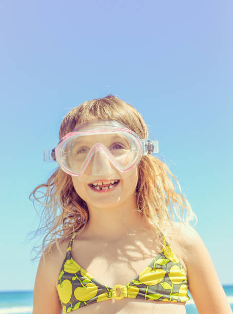 istock Snorkel Mask and the Girl 961633874