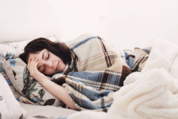 istock sick girl in bed 961633892