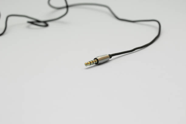 istock close-up of a Headphone Jack on white background 961634986