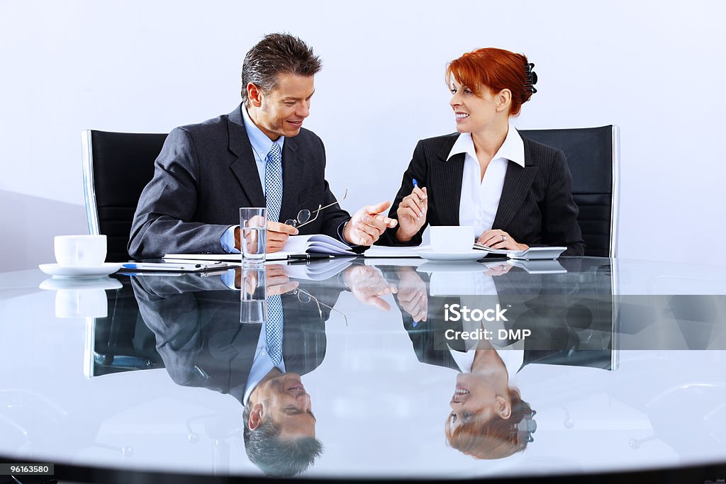 Mature Business colleagues working in a modern office  Assistance Stock Photo