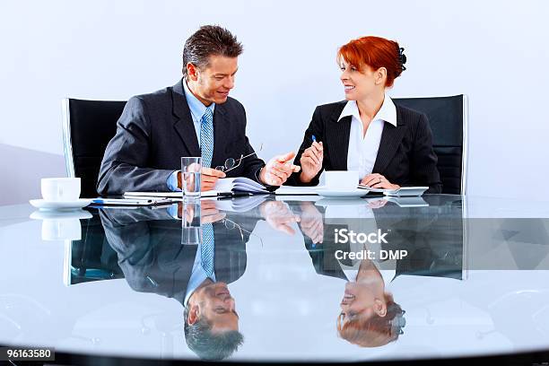 Mature Business Colleagues Working In A Modern Office Stock Photo - Download Image Now