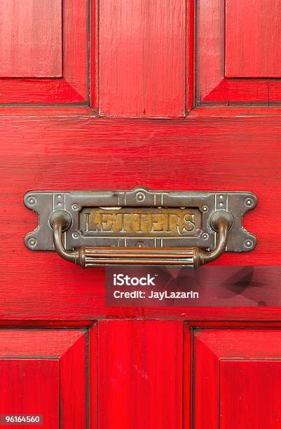 Bright Red Patina Door With Old Metal Letters Slot Stock Photo - Download Image Now