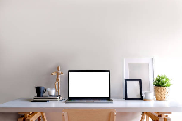 istock Loft workspace mock up laptop computer on wood table. copy space and blank screen for graphics montage. 961648640