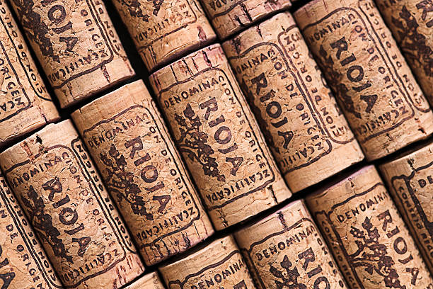 Rioja corks lined up in rows neatly and diagonally Rows of Rioja wine corks - shallow dof rioja photos stock pictures, royalty-free photos & images