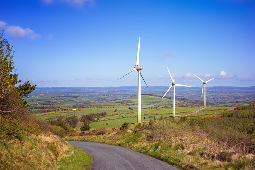 Landscape with windmills on a blue  sky in a county Cork. Boggeragh Mountains, Ireland.