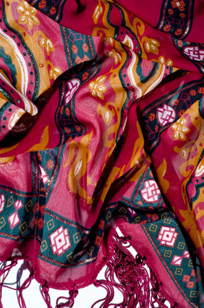 istock Background texture, pattern. Red maroon fabric. Click on your local heritage with this red, bard and yellow striped silk. This patterned fabric will decorate your design. your work will be exclusive 961667602