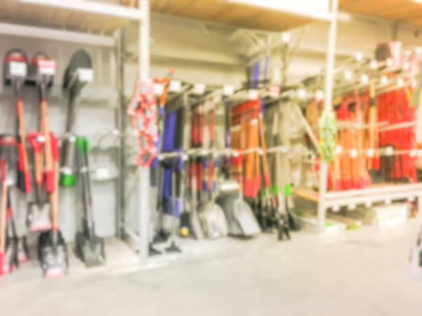 istock Blurred shovels and gardening tools sale at home improvement store in USA 961667708