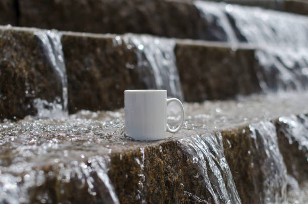 istock Blank white mug on the fountain steps 961672836