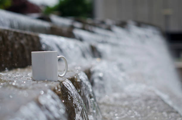 istock Blank white mug in a flowing fountain 961672848