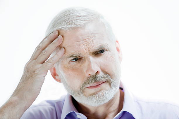 istock migraine or memory loss illness senior man headache 96167547