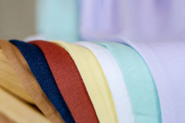 istock Close up of Children Cloth. Stack of Kids Fabric, Selective focus on front 961676808