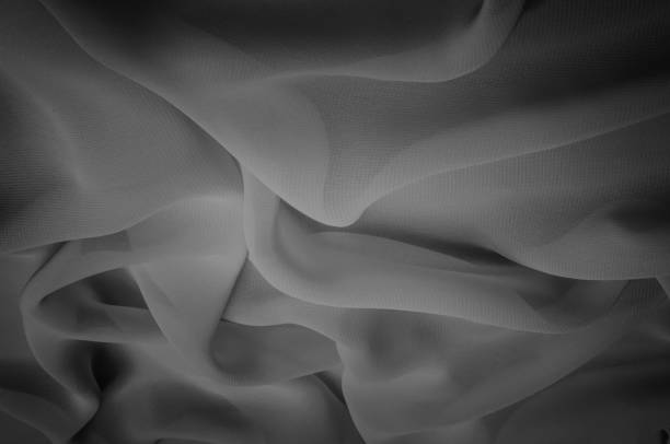 istock silk fabric is transparent, black and white. this material contains a coarser texture, a more rigid drapery and a slight peeping effect. We recommend using this fabric for your convenience. 961676926