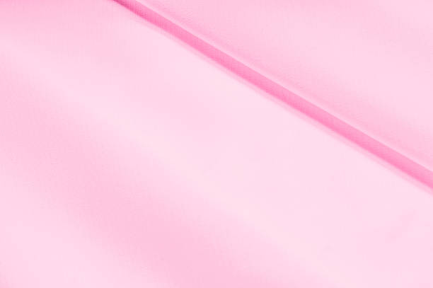 istock Background texture template. silk fabric is dense, pink. Teanting with texture, Shantung has a satisfactorily nubby arm paired with a visual grain all its own. Clear, yet flexible Bright and durable 961677128