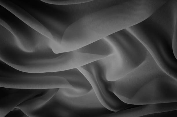 istock silk fabric is transparent, black and white. this material contains a coarser texture, a more rigid drapery and a slight peeping effect. We recommend using this fabric for your convenience. 961677142
