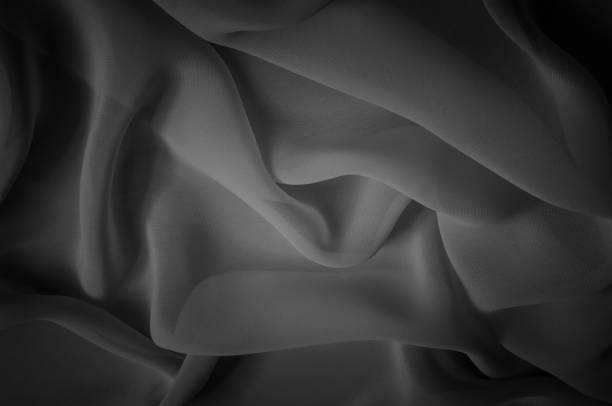 istock silk fabric is transparent, black and white. this material contains a coarser texture, a more rigid drapery and a slight peeping effect. We recommend using this fabric for your convenience. 961677186
